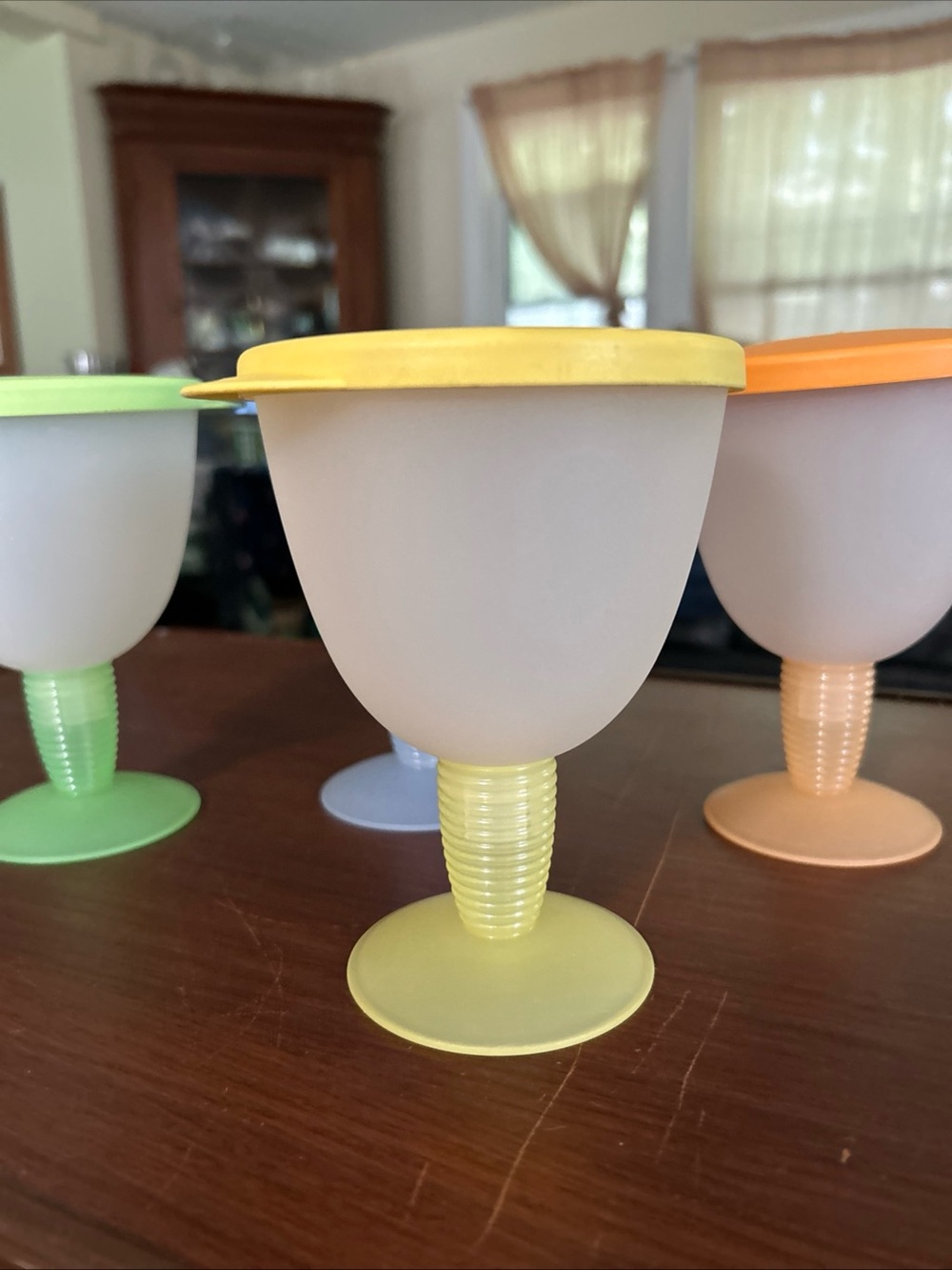 Vintage Tupperware set of four pastel drinks cups with straw hole 10 oz capacity